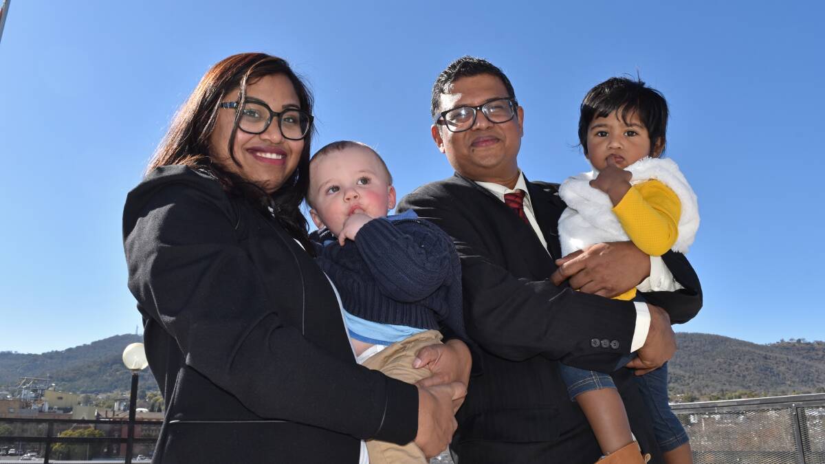 HAPPY HOME: Priyanka Biswas with Ted Simmonds, Henry Julian Mukuti and Rhiannon Mukut at Thursday's citizenship ceremony. Photo: Ben Jaffrey 20190725ABJ25