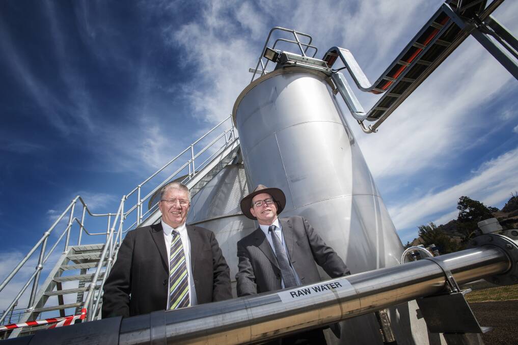 SPLASH: Tamworth mayor Col Murray and council director of water and waste Bruce Logan unveil Nundle $2.3m upgraded water treatment plant. Photo: Peter Hardin