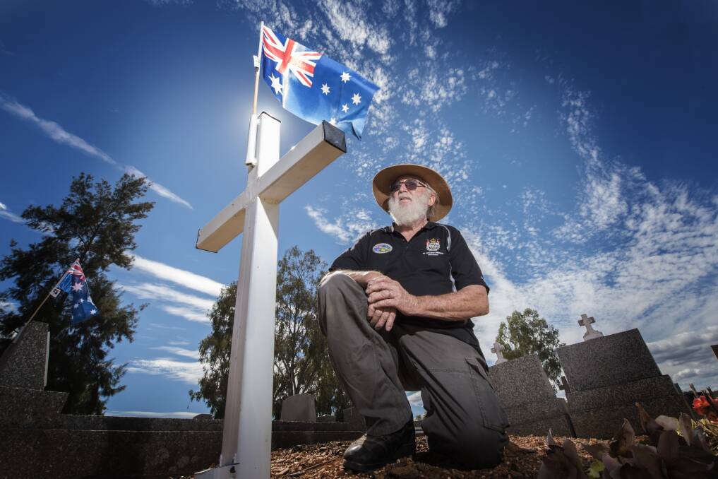 FLY THE FLAG: Manilla RSL secretary Ian Bignall has dedicated countless hours marking the graves of local returned and ex-servicemen. Photo: Peter Hardin 160419PHB021