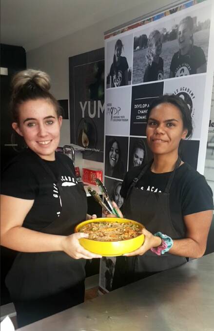 BON APPETITE: Tamworth High students Maggie Irwin and Kooriana Boney at the Sydney Cooking School in Sydney this week. Photo: Supplied
