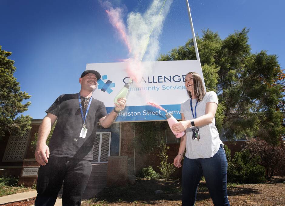 FUN RUN: Darren Spinks and Kirsty Lachlan from Challenge gear up for the service's inaugural colour run on Friday. Photo: Peter Hardin 061119PHE013