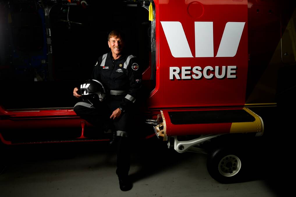 DECADES OF DILIGENCE: Warners Bay pilot Peter "Cookie" Cook celebrated thirty years with the Westpac Rescue Helicopter Service. Picture: Jonathan Carroll