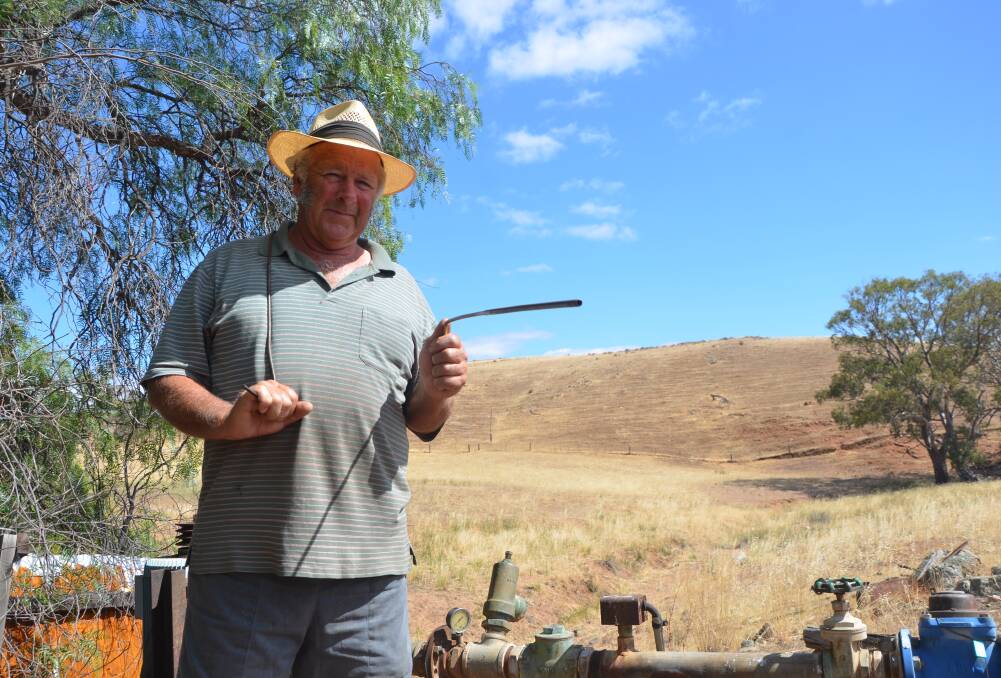 BOWING OUT: Roger Fiebig has hung up his water divining rods after five decades of helping fellow farmers find water. The fascinating, and contentious, pursuit is considered an endangered artform by those who practice it.