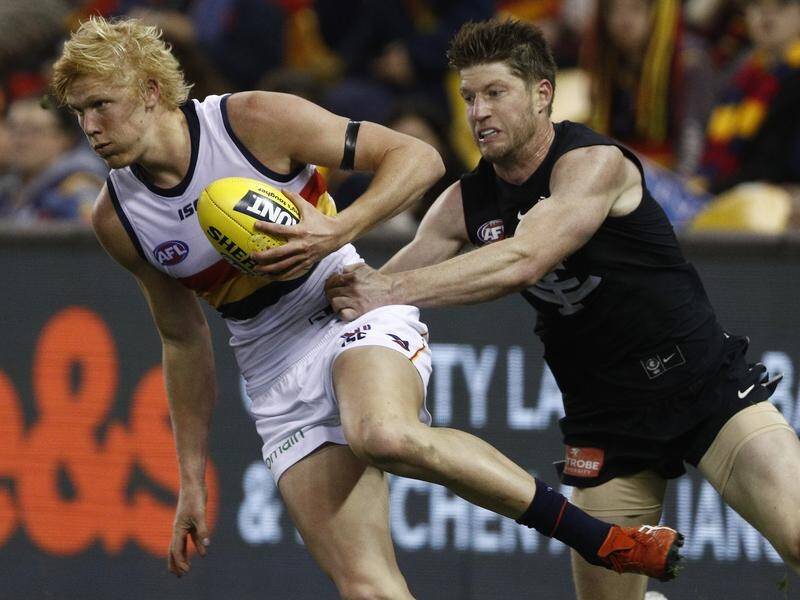 Sam Rowe (right) has been delisted by Carlton one game shy of his 100th game in navy blue.