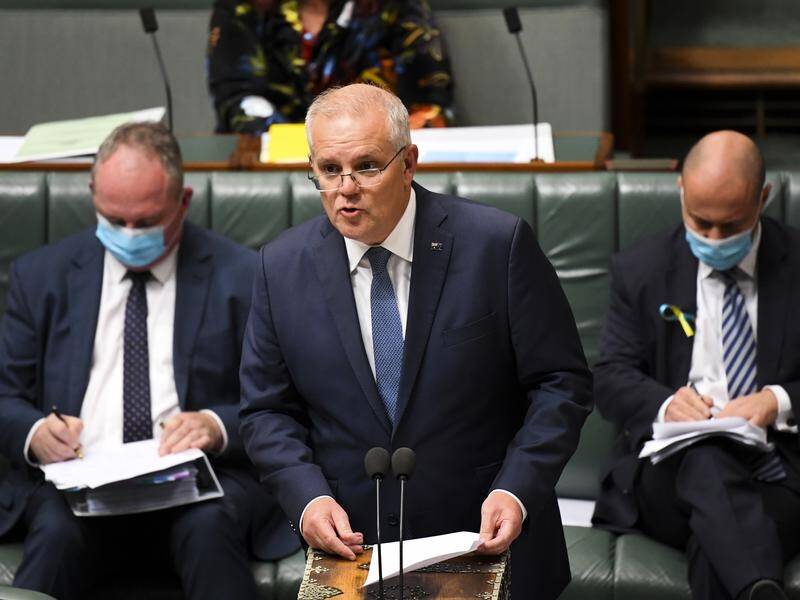 Former prime minister Scott Morrison is under fire over his secret swearing-in to five portfolios. (Lukas Coch/AAP PHOTOS)