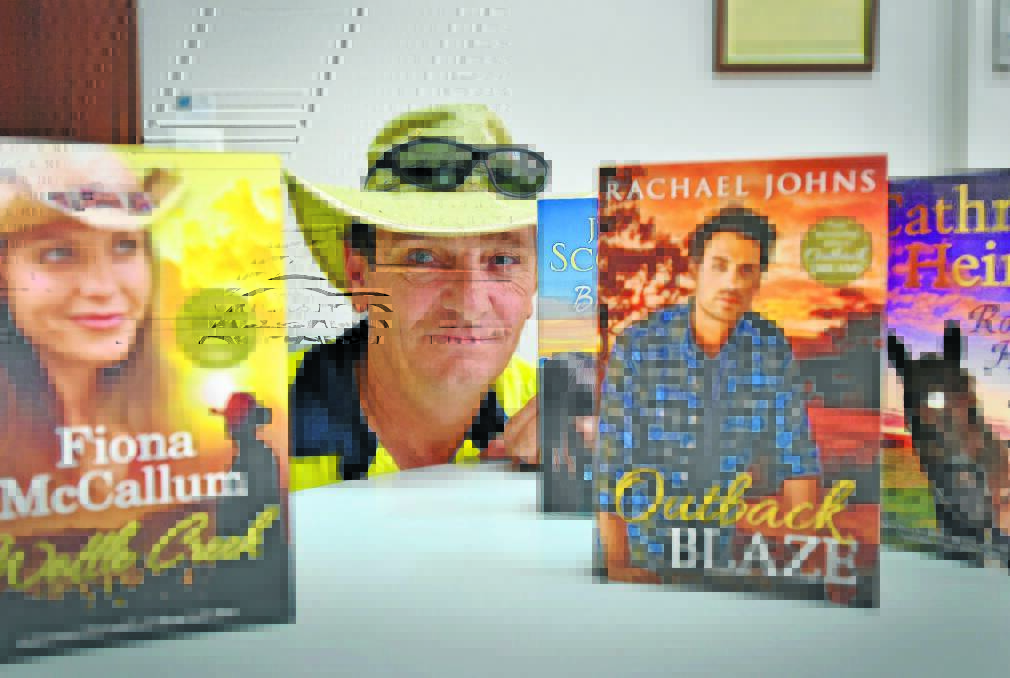 MISUNDERSTOOD: Len Klumpp believes men should not judge rural romance books by their covers. Photo: Geoff O Neill 080415GOB01