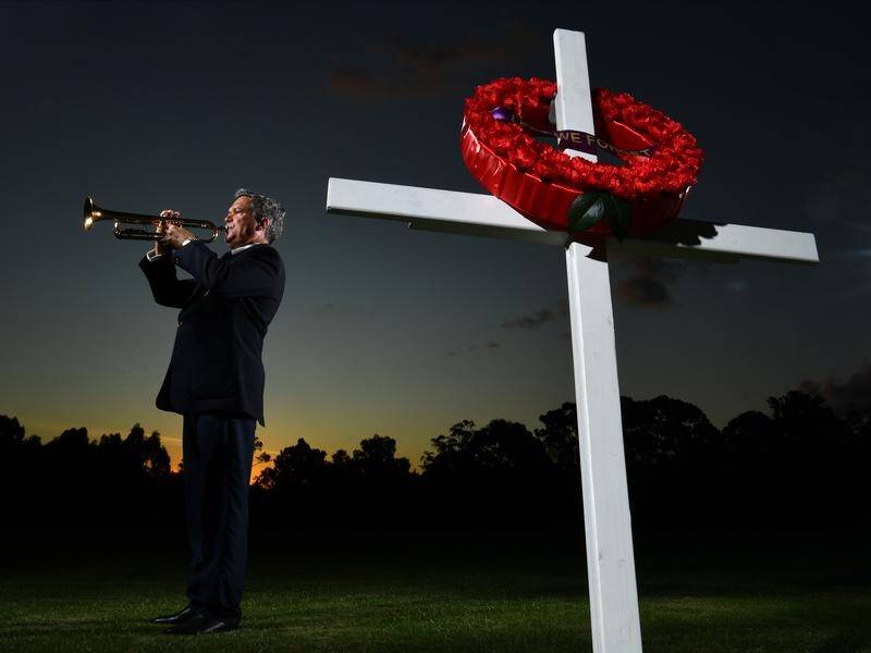 Music teacher Alastair Tomkins is urging other musicians to mark Anzac Day by playing the Last Post.