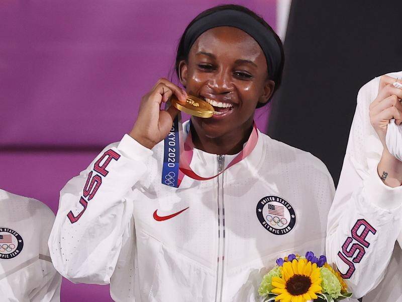 Jackie Young with her Olympic gold medal as part of the US women's 3x3 basketball team.