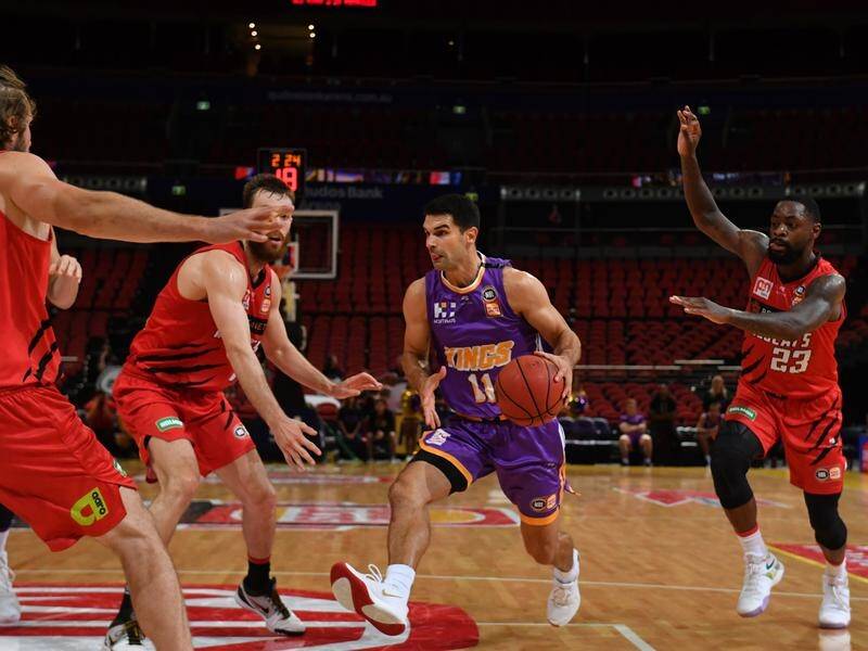 Sydney Kings' Kevin Lisch (c) has called time on his basketball playing career.