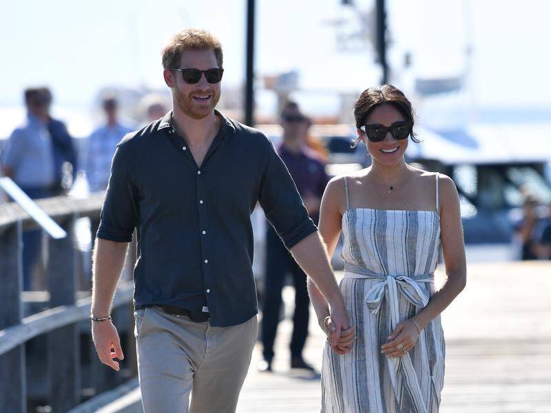 Harry and Meghan took a stroll on Kingfisher Bay jetty at the end of a visit to Fraser Island.
