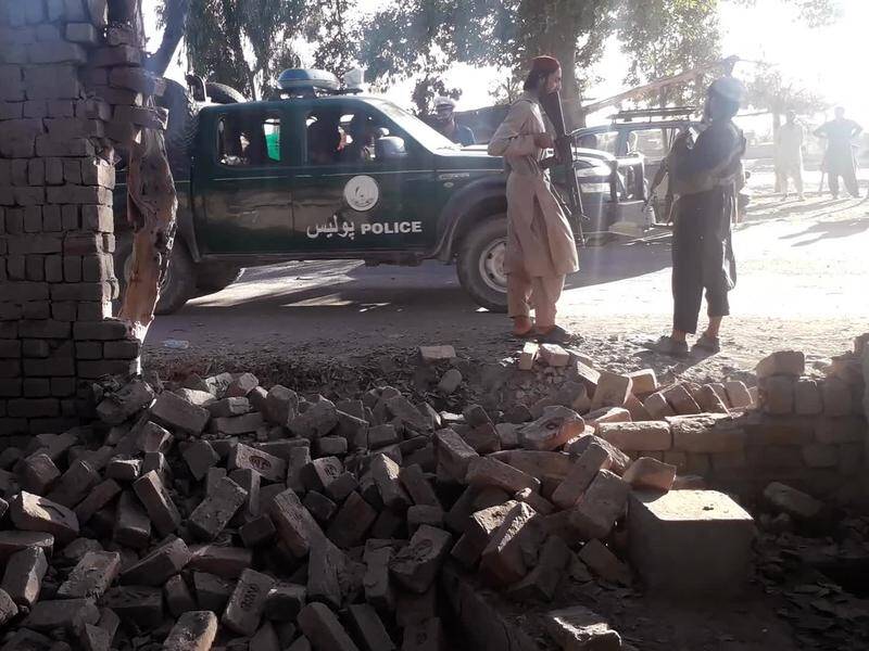 Officials say two bombs detonated as a Taliban vehicle was passing by in Jalalabad, killing a child.
