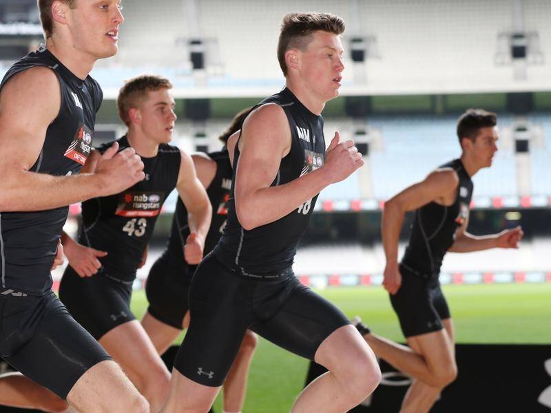 Popular opinion has Sam Walsh (C) going to Carlton with the top pick in the AFL draft.