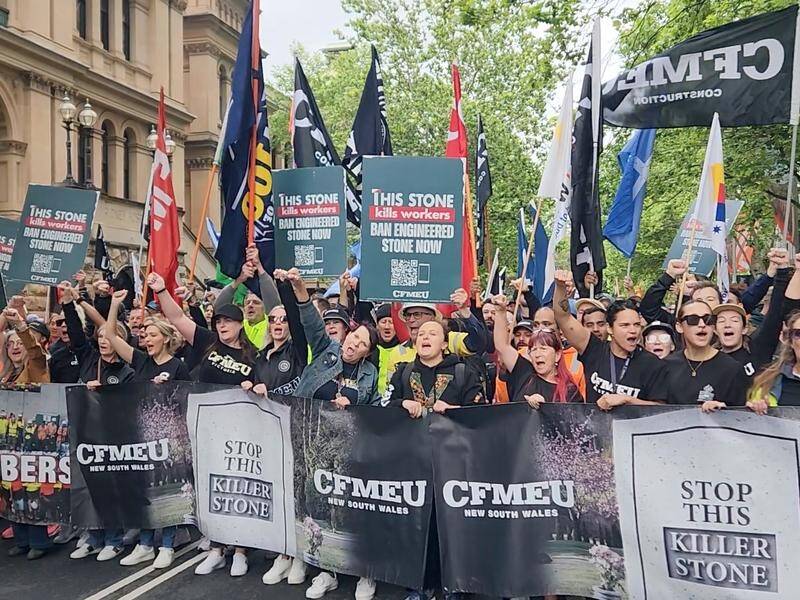A CFMEU rallied in Sydney in the ongoing campaign for a ban on engineered stone. (Luke Costin/AAP PHOTOS)