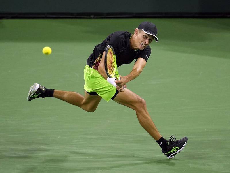 Alex de Minaur has advanced to the second round in Vienna with a victory over Kevin Anderson.
