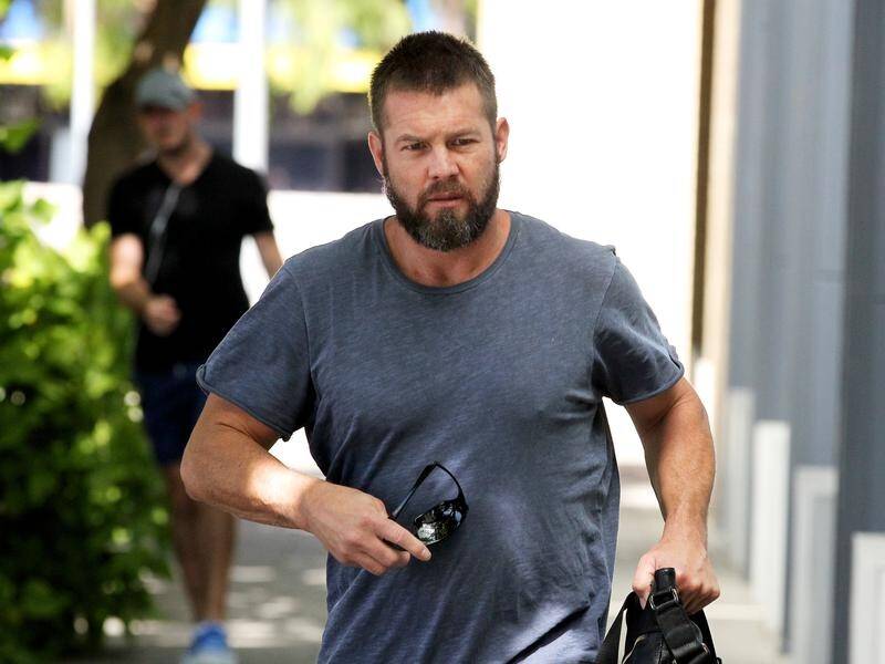 Ben Cousins has been fined for meth possession but could stand trial over alleged family violence.