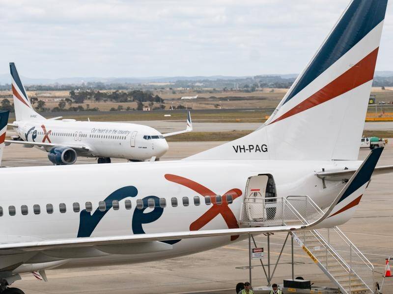 A passenger plane made an emergency landing in Melbourne after smoke was found in a toilet. (Luis Ascui/AAP PHOTOS)