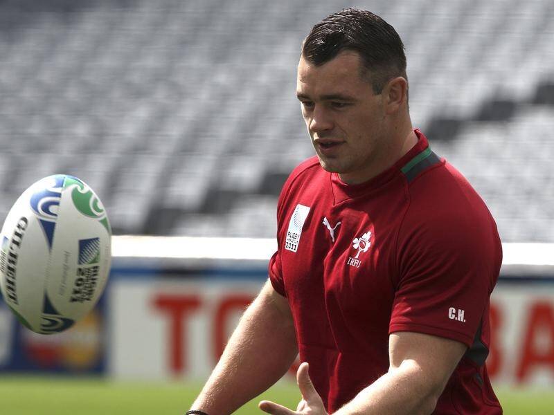 Ireland's Cian Healy will win his 100th cap after being chosen for the Six Nations Test in France.