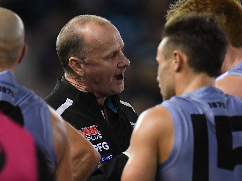 Port vice-captain Ollie Wines (partially concealed) says he deserved coach Ken Hinkley's blast.