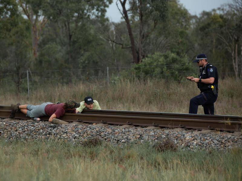 Tammy Omodei and Andy Paine locked themselves to a railway line in a bid to stop a Bravus train.