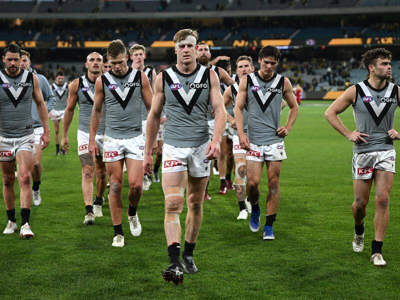 Tom Jonas, leading his Power teammates off, was at the centre of concussion drama at the MCG.