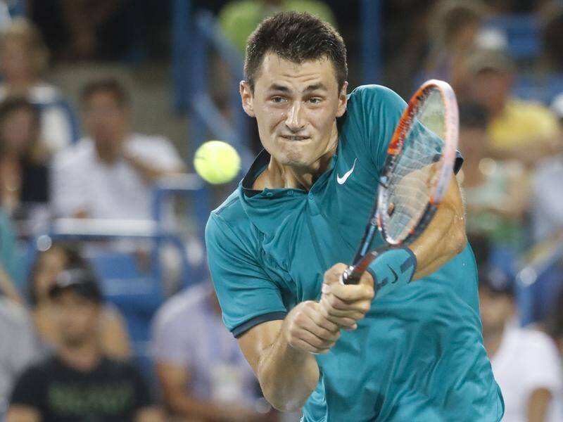 Bernard Tomic's father says he will take legal action against Lleyton Hewitt.