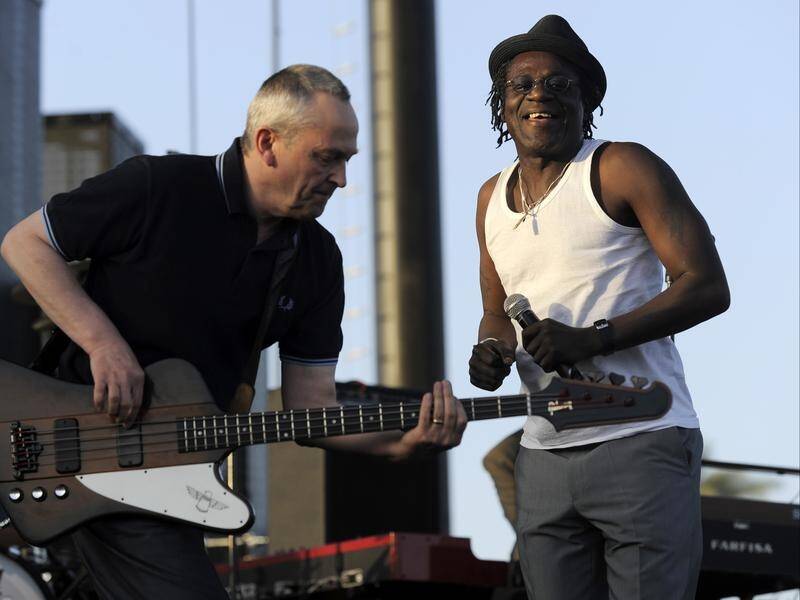 The grandson of The Special's singer Neville Staple (R) has been stabbed to death in the UK.