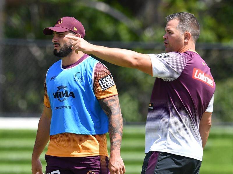 Jack Bird (left) and Broncos coach Anthony Seibold (right) at training for the NRL club.
