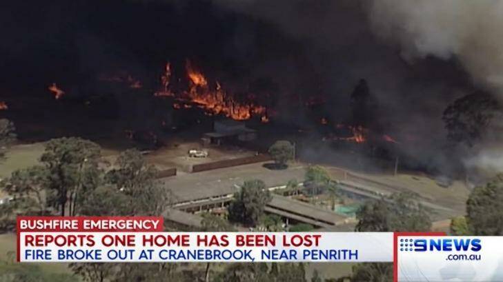 At least one house has reportedly been lost in the fire at Cranebrook. Photo: Channel Nine