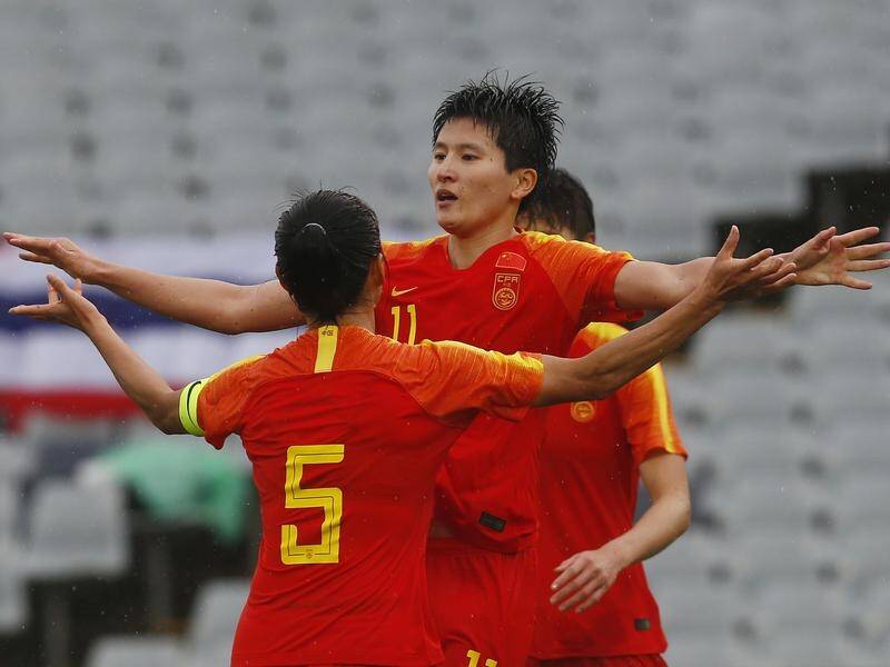 China has thrashed Thailand 6-1 in their opening Olympic Games qualifier in Sydney.