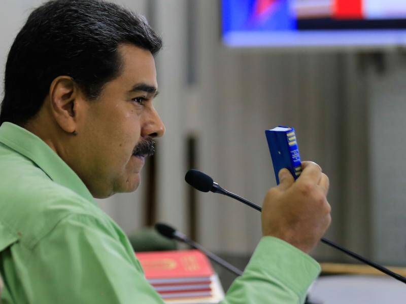 Venezuela President Nicolas Maduro plans to restructure his government, his vice president says.