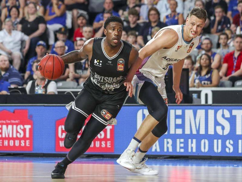 Lamar Patterson (L) has tallied 27 points in the Bullets' 106-104 NBL win over Adelaide in Brisbane.
