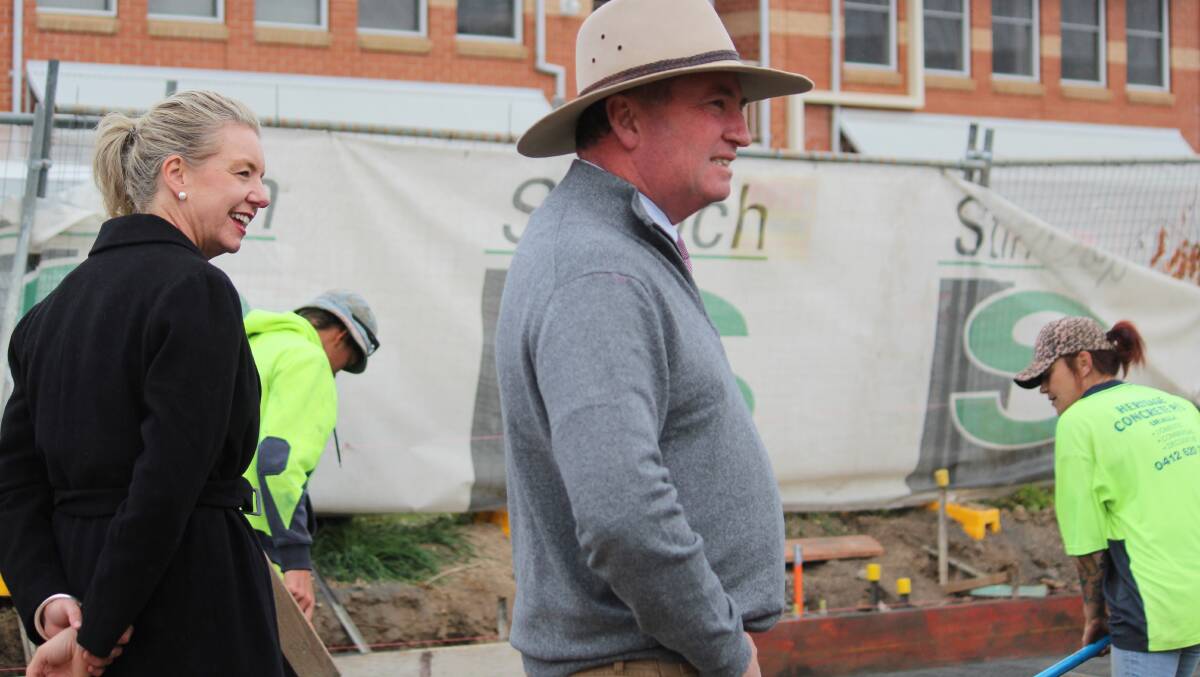 NEAR FINISHED: Minister for Regional Services, Sport, Local Government and Decentralisation Bridget McKenzie and Member for New England Barnaby Joyce inspect the progress of Armidale's new APVMA building.