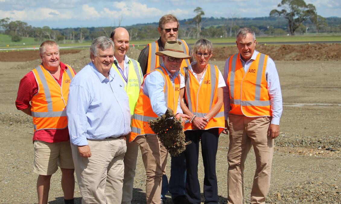 UNDERWAY: Crs Jon Galletly and Peter Bailey, acting Airport manager Allan Buckley with Adam Marshall, Crs Andrew Murat, Libby Martin and Mayor Simon Murray.