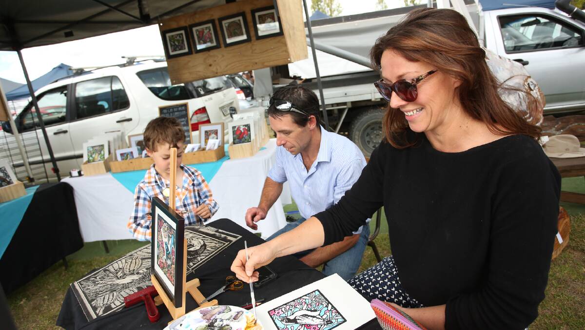 VARIETY: Stall holders and artists Ray Noone and Sophie Sorella using their brushes at last year's event   Picture: Simon Scott