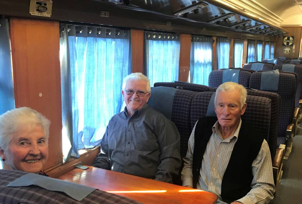 TRAVELLING: (l-r) Lynn McClenahan, Terry Knights and Greg McClenahan test the seats for comfort.