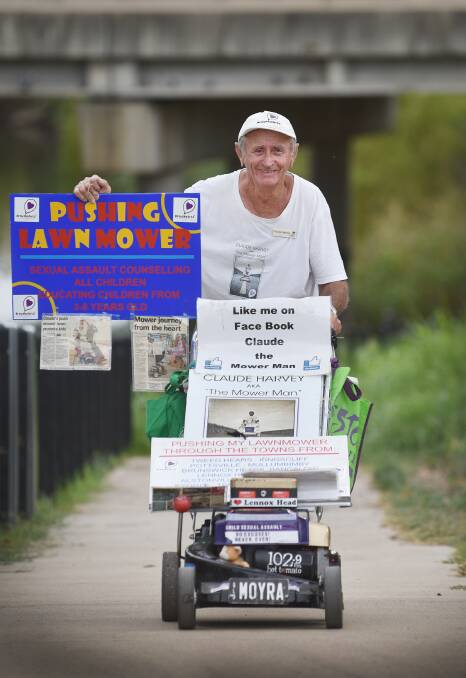 MOWER ON THE MOVE: The mower man Claude Harvey is raising money in Tamworth for child victims of sexual assault. Photo: Barry Smith 260215BSA07