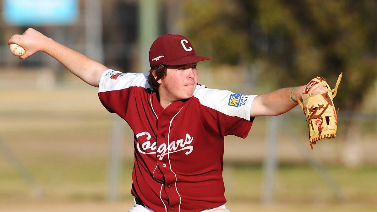 Young Cougars pitcher Brock Ridgewell lets fly against the Warriors. 120714GOI01