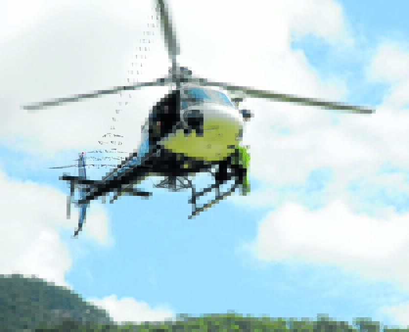 CO-ORDINATED OPERATION: New England police backed specialist detectives from the Drug Squad, as well as the police helicopter, to search the rugged 
terrain across the New England area. 
Photo: NSW Police