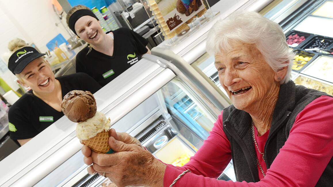 ICE BABIES: New Zealand Natural 
Icecream staffers Ellee Wallington and Rochell Wright, back, are all smiles with fan and customer Margot Hobson at the hot sales record for autumn ice creams.  Photo: Barry Smith 280514BSD02