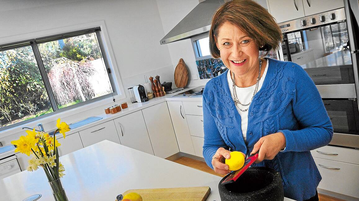 CUT ABOVE: Former My Kitchen Rules contestant Kathy Lisle at her home in Walcha. Mrs Lisle and daughter Anna will co-host a series of special cooking classes at the home from next month. 
Photo: Gareth Gardner 230714GGC01