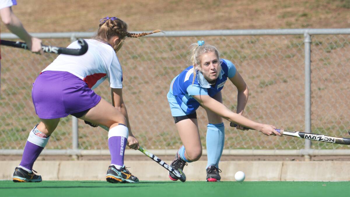 Claudia Neilsen was one of Olympians best in their three goal win over Waratahs.  Photo: Barry Smith 270714BSD01