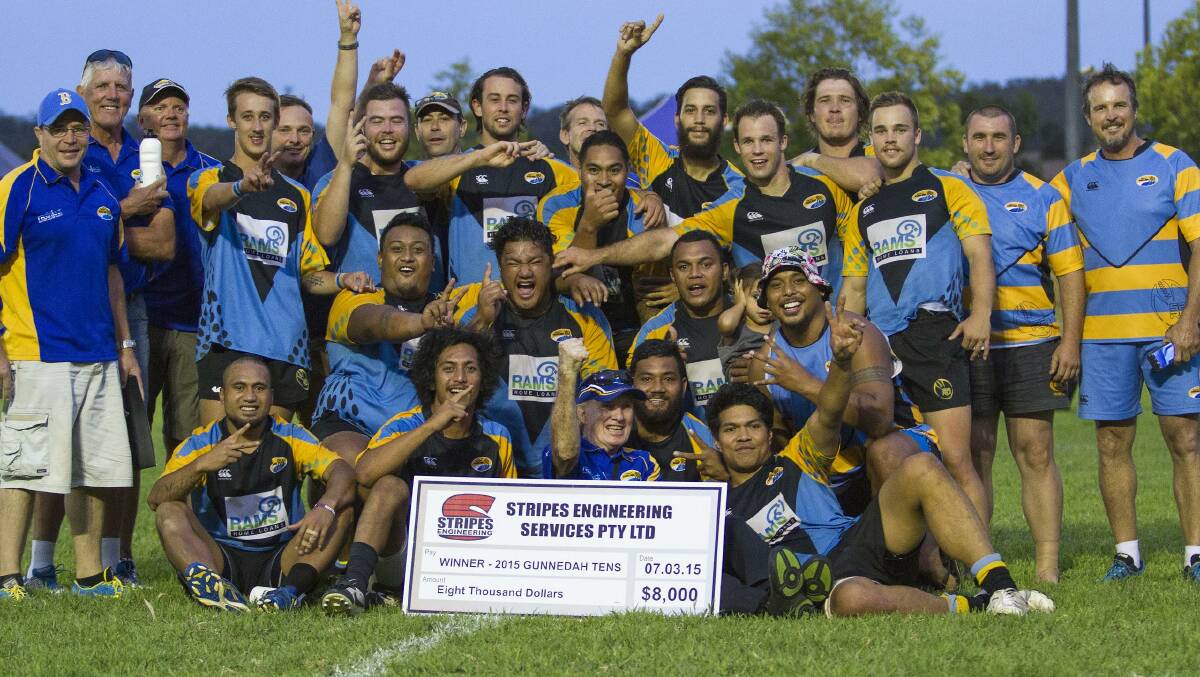 The Southern Beaches squad with their winner’s cheque after taking out their second Gunnedah Tens in a row.  Photo: Mal Frend