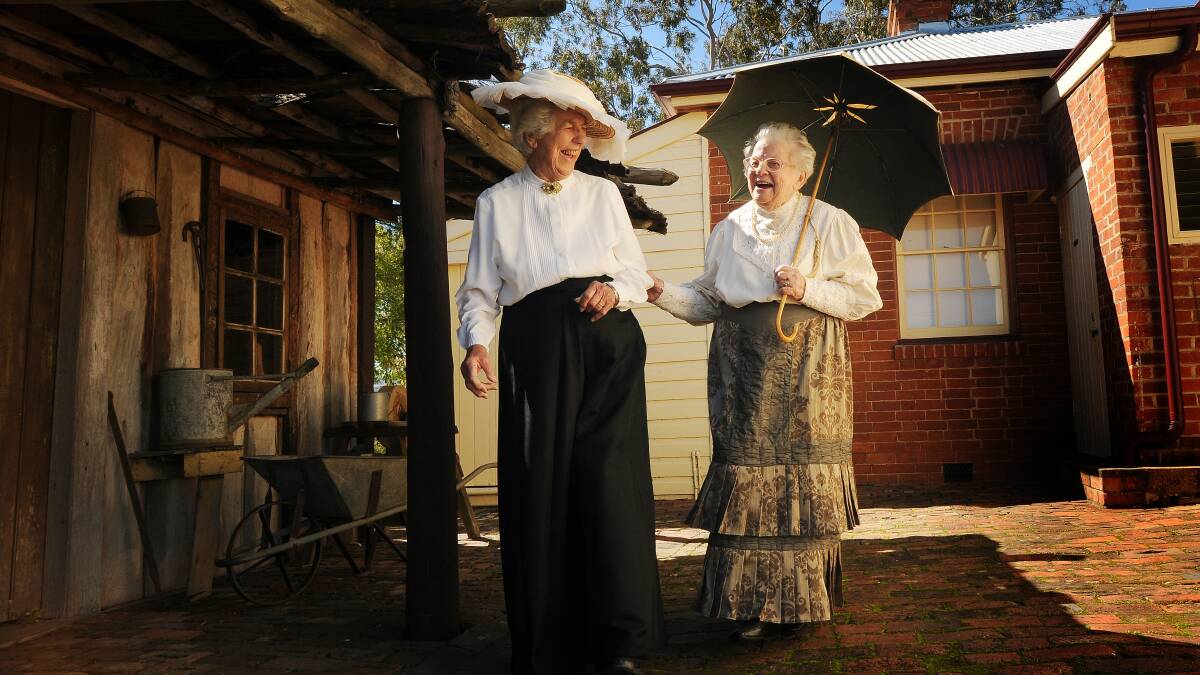 LEADING LADIES:  Marlene Ford, left, with Audria Rodgers at Calala Cottage during last year’s Spring Fair. Mrs Rodgers has been presented with the inaugural Warren Newman Memorial Award  for her significant work in preserving Tamworth’s history. Photo: Gareth Gardner