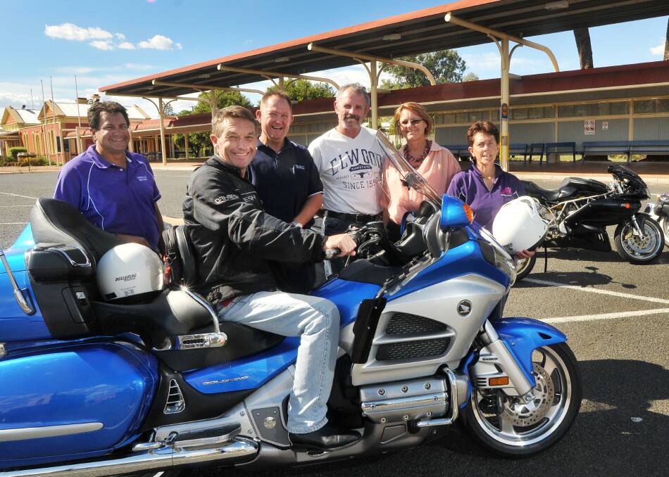SUPPORTIVE: Black Dog Ride organiser Rod Thompson, third from left, with ride participants Bruce Clare, Richard 
Procter, Jim 
Penberthy, Venessa Penberthy and Robyn Procter.  Photo: Gareth 
Gardner  250214GGC02