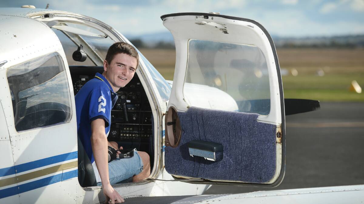 AIMING FOR THE SKY: Young Tamworth pilot Sam Harris has always wanted to fly and one day wants to be responsible for hundreds of airline passengers. Photo: Barry Smith 210614BSC02
