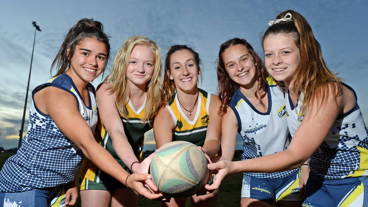 Tamworth oztaggers (from left) Taylor Holcombe, Abby Schmiedel,  Bronte Harris, Megan Murphy and Steph Fulwood all played for either Australia or the Australian Barbarians last weekend. Photo: Barry Smith 190614BSE01