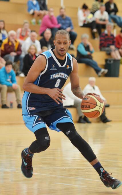 Tevin Hurd on the attack for Tamworth. He top-scored with 18 in Saturday night's huge comeback finals win over Hawkesbury Jets Orange at the 
Tamworth Sports Dome. Photo: Barry Smith 100814BSE16