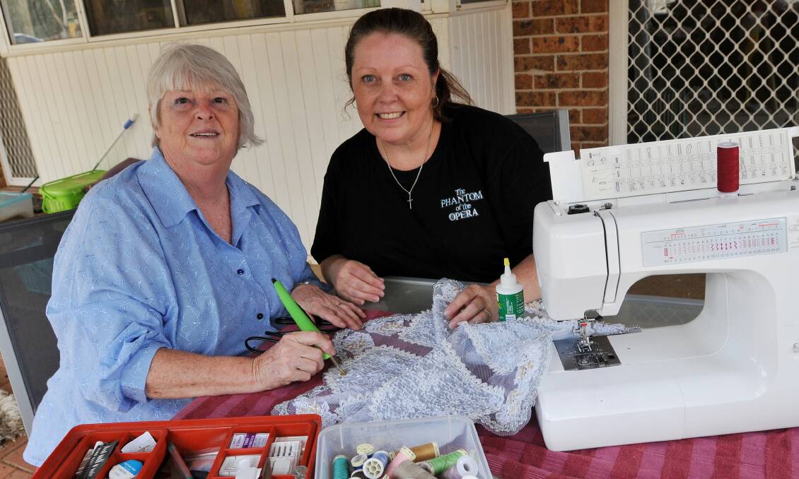 DOLLY GIRLS: Tamworth wardrobe production specialist Robyn Bourke and Kathy Burke have some super sewing stories about Dolly Parton in their theatrical resume now.   Photo: Gareth Gardner
180214GGG02