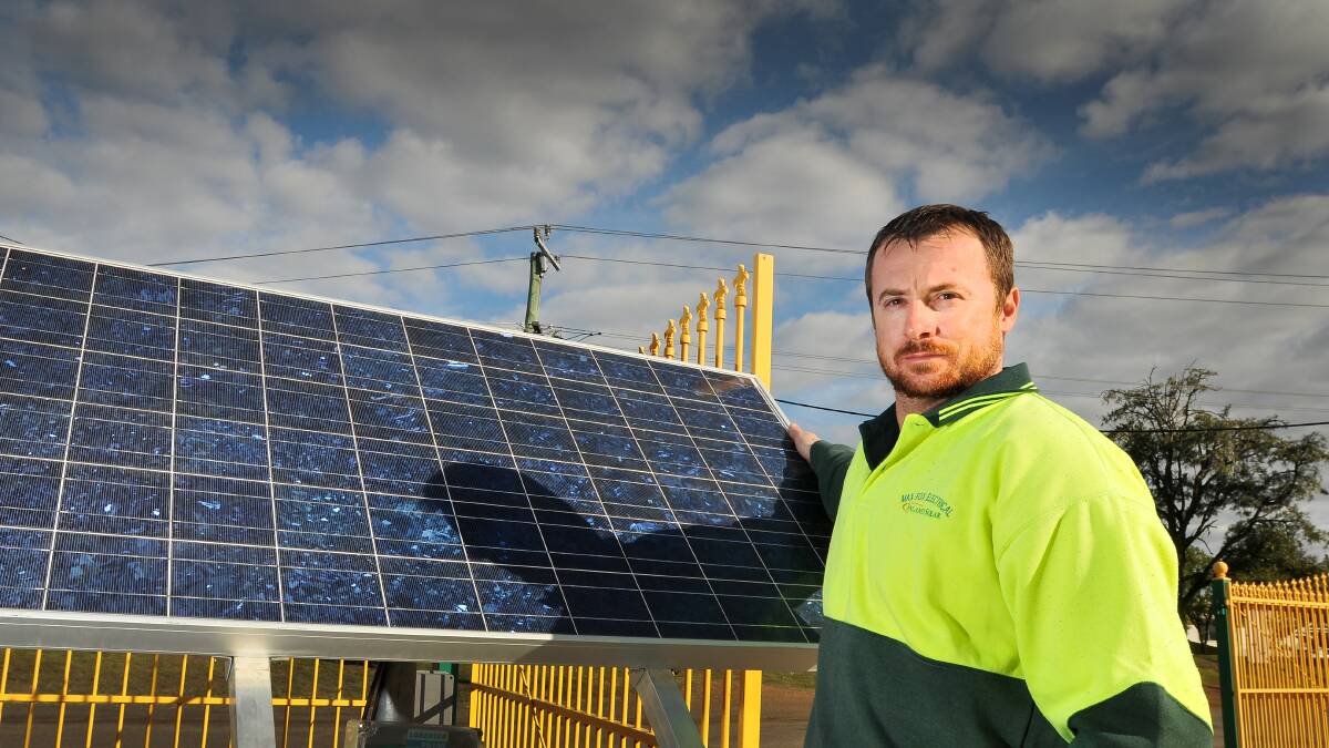 LEADING SOLAR CHARGE: Max Fox Electrical manager Chris Pollock said regional areas are still leading the charge for solar technologies. Photo: Gareth Gardner 050514GGC01