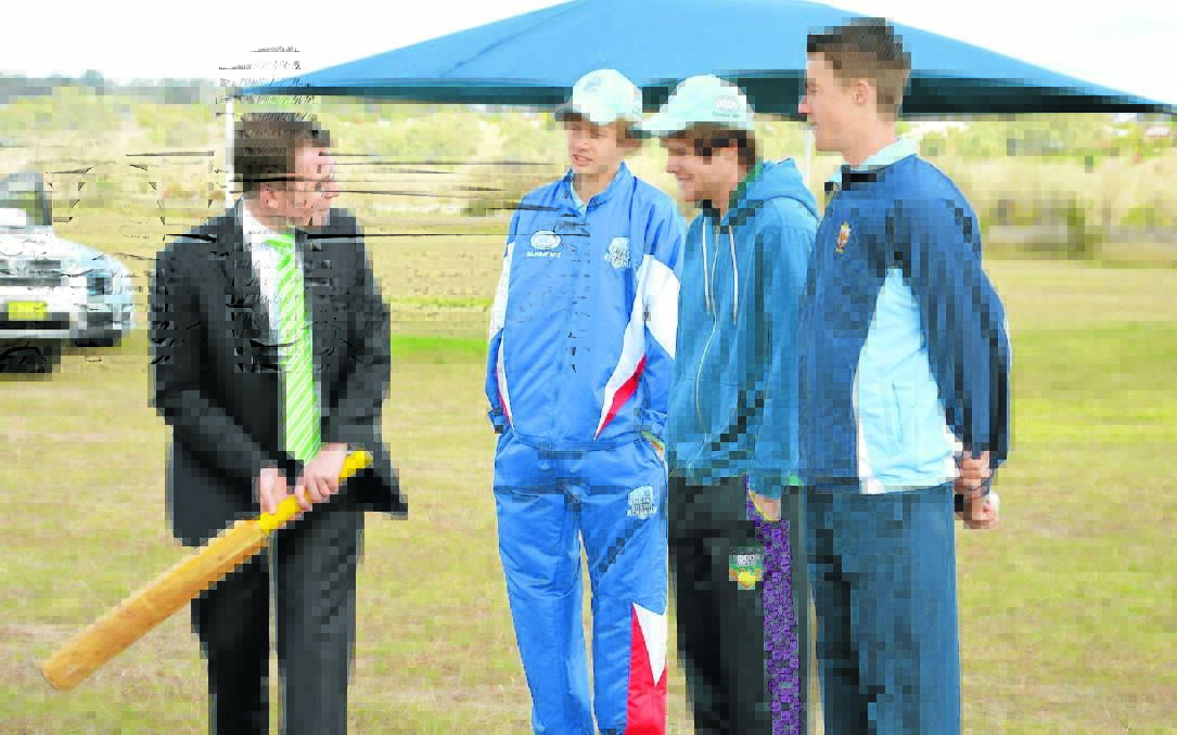 BIG HIT: Local MP Adam Marshall swapped cricket stories at the funding announcement yesterday with Inverell Junior cricketers Joe Smith, Alex Smith and Tom Scoble.